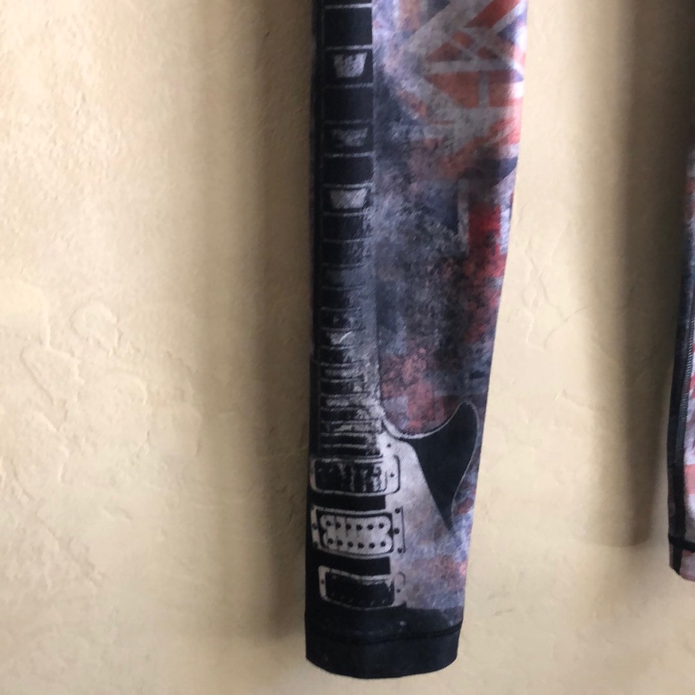 With leggings with guitar on leg